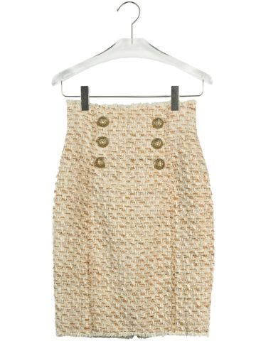 Beige tweed skirt embellished with gold buttons