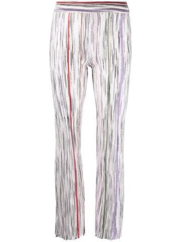 Pantaloni semi trasparenti con paillettes multicolore
