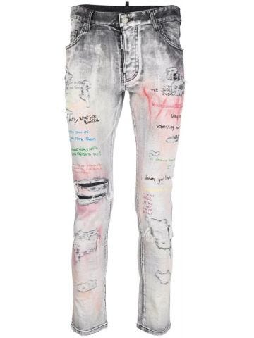 Jeans dritti grigi con stampa graffiti