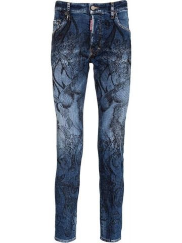 Jeans skinny blu con stampa floreale